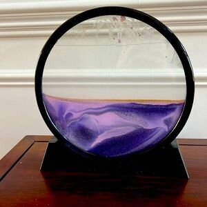 Sand art display. In purple color.